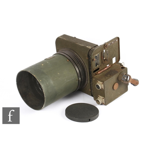 94 - A World War Two RAF gun camera, type G.45, 24 volts, serial number 16079, length 31cm, and a US Air ... 