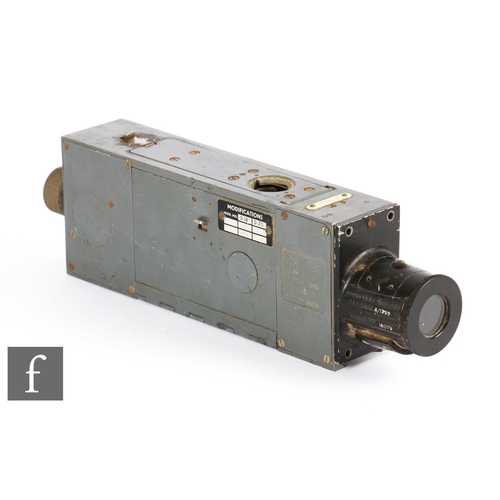 94 - A World War Two RAF gun camera, type G.45, 24 volts, serial number 16079, length 31cm, and a US Air ... 