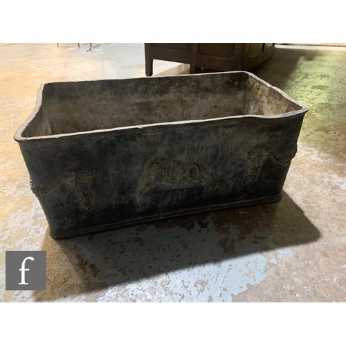 480 - A 19th Century or later rectangular lead planter, the side applied with swags and recumbent lions, h... 