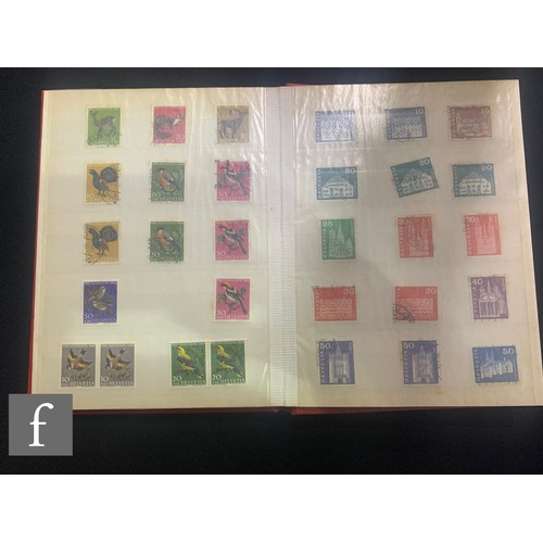 391 - A world collection of stamps to include European and South American collections, stock books and alb... 