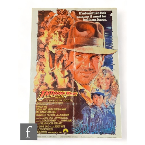 412 - An Indiana Jones and The Temple Of Doom 1984 US One Sheet poster, starring Harrison Ford, Drew Struz... 