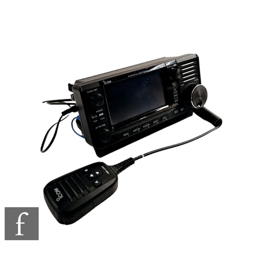 542 - An ICOM IC-705 HF/VHF/UHF all mode mobile transceiver with a ICOM HM-243 microphone.