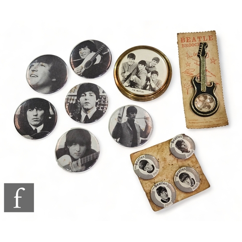 393 - A collection of original 1960s Beatles related items, to include a compact, a set of four carded bad... 