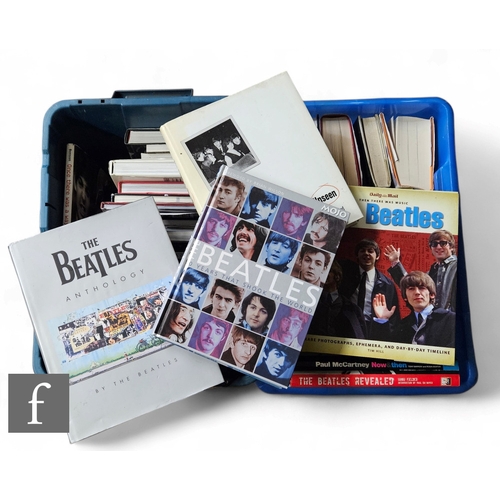 389 - A large quantity of Beatles and Rolling Stones related hardback books. (43).