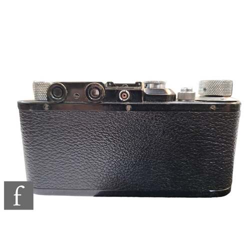 84 - A Leica III set, comprising camera body, various lenses and accessories in fitted case.