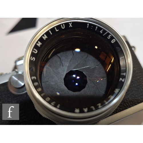 85 - A Leica IIIf camera outfit, camera serial number 661171, with Leitz Summilux f1.4 50mm lens serial n... 