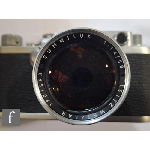 85 - A Leica IIIf camera outfit, camera serial number 661171, with Leitz Summilux f1.4 50mm lens serial n... 