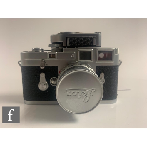 88 - A Leica M3 (double wind), serial number 912881, circa 1957 with Summicron 50mm f/2 lens.