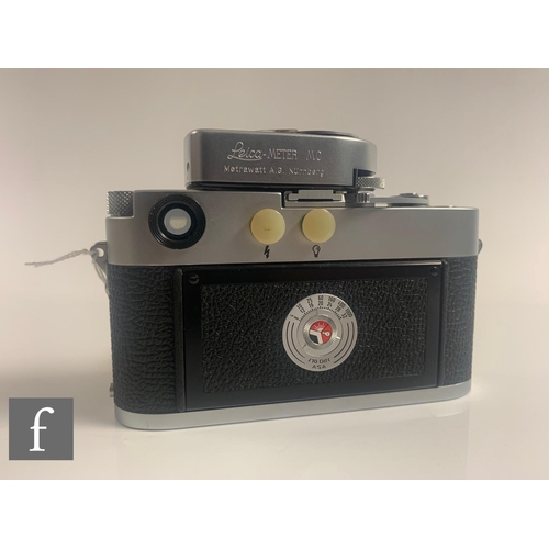 88 - A Leica M3 (double wind), serial number 912881, circa 1957 with Summicron 50mm f/2 lens.