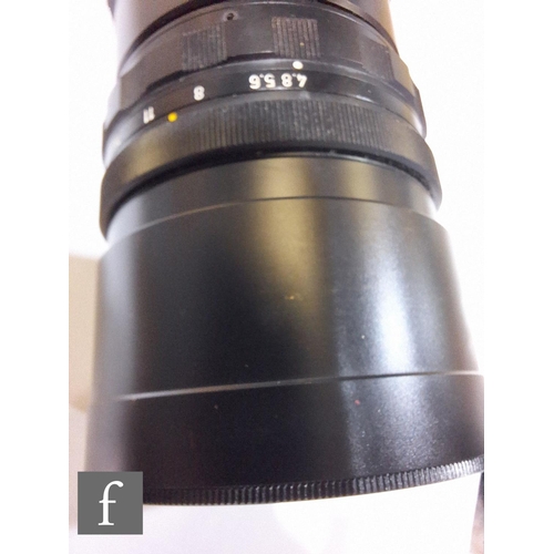 138 - A collection of Leica camera lenses to include Leica f4.8 280mm Teylt telephoto lens, serial number ... 