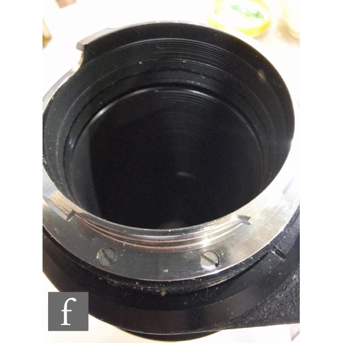 138 - A collection of Leica camera lenses to include Leica f4.8 280mm Teylt telephoto lens, serial number ... 