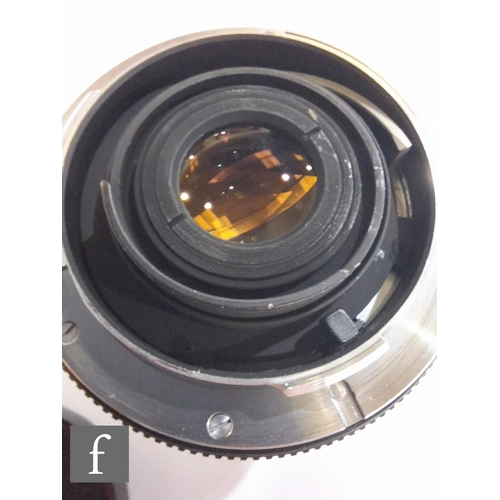 138 - A collection of Leica camera lenses to include Leica f4.8 280mm Teylt telephoto lens, serial number ... 