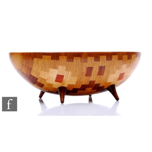 1111 - Bill Robinson - A contemporary segmented woodturned footed bowl of ovoid form, decorated in a diamon... 