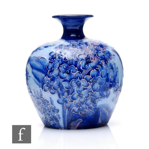 173 - William Moorcroft - James Macintyre & Co - A small Florian range vase circa 1905, the shouldered... 