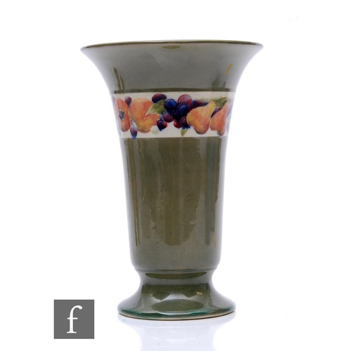 189 - William Moorcroft - Banded fruit - A vase circa 1918, of footed sleeve form with everted rim, decora... 