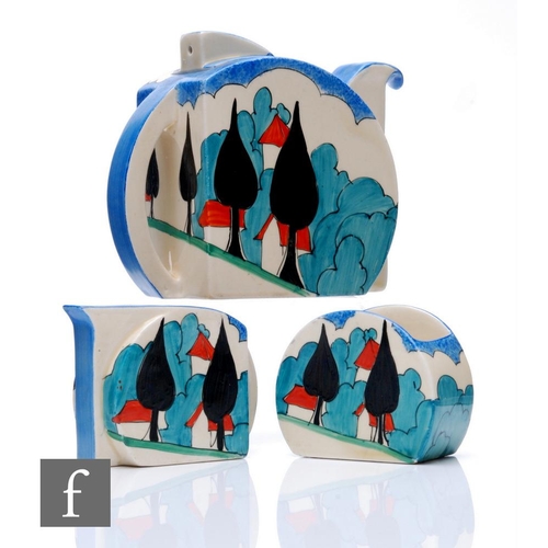 Clarice Cliff - May Avenue - A Stamford shape teapot, milk and sugar circa 1933, hand painted with a stylised tree landscape with red roof cottages amongst blue bushes and black spade form trees, FANTASQUE and Bizarre mark, height 12cm. (3)