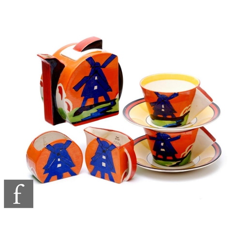 219 - Clarice Cliff - Applique Windmill - A Stamford shape early morning breakfast set comprising teapot, ... 