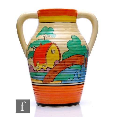 222 - Clarice Cliff - Orange Roof Cottage - A double handled Lotus jug circa 1932, hand painted with a sty... 