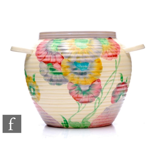 283 - Clarice Cliff - Pink Pearls - A twin handled ribbed body biscuit barrel (lacking cover) hand painted... 