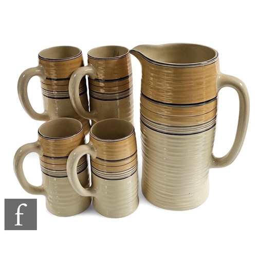 318 - Clarice Cliff - Banded 6328 - A large ribbed lemonade or beer jug circa 1935, with four matched loop... 