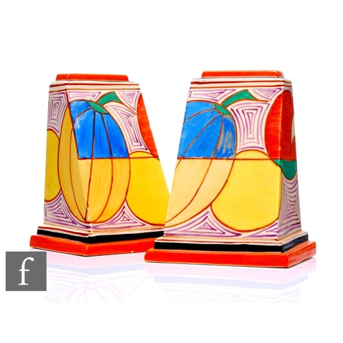 334 - Clarice Cliff - Melon - A pair of shape 405 bookends circa 1930, each hand painted with stylised abs... 