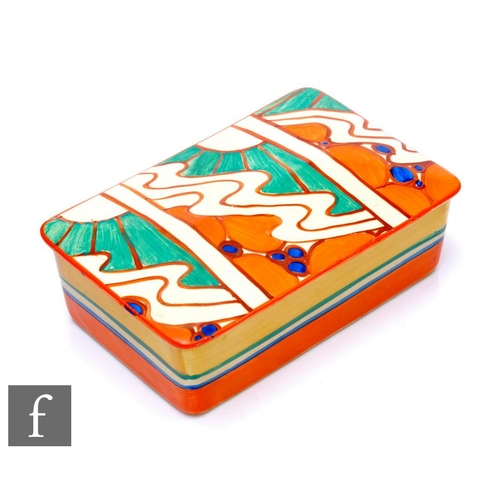 349 - Clarice Cliff - Sunrise Orange - A lidded box circa 1929, hand painted with panels of sunburst and p... 