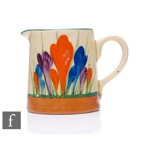 416 - Clarice Cliff - Crocus - A Tankard shape cream jug circa 1930, hand painted with crocus sprays withi... 