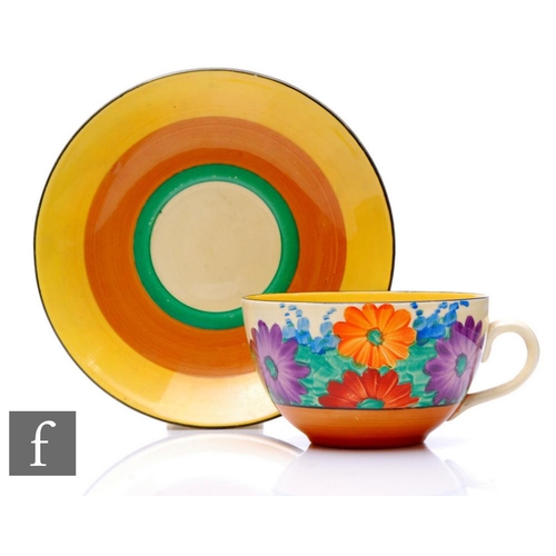 417 - Clarice Cliff - Gay Day - A large Globe shape tea cup and saucer circa 1931, hand painted with styli... 