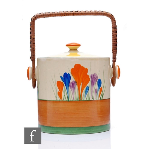 419 - Clarice Cliff - Crocus - A Hereford shape biscuit barrel circa 1930, hand painted with Crocus sprays... 