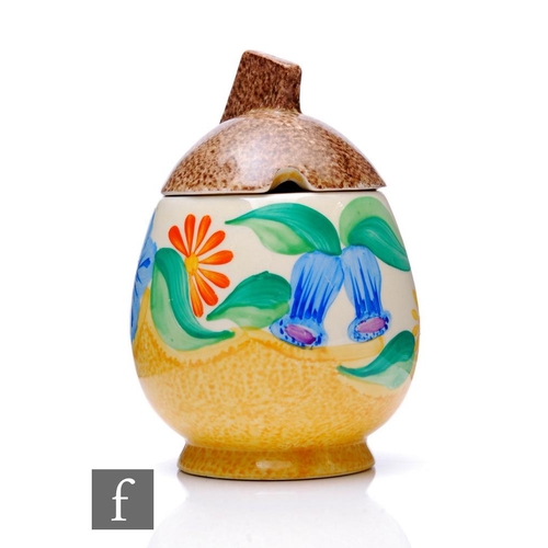 421 - Clarice Cliff - Canterbury Bells - A Daffodil shape preserve pot and cover circa 1933, hand painted ... 