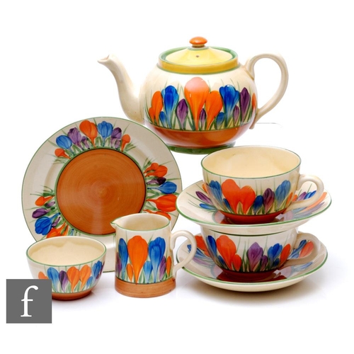 428 - Clarice Cliff - Crocus - A Globe shape early morning breakfast set circa 1929, comprising teapot, mi... 