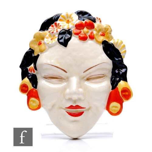 460 - Clarice Cliff - Flora - A wall mask circa 1936, relief moulded as a lady's face with floral hair pic... 