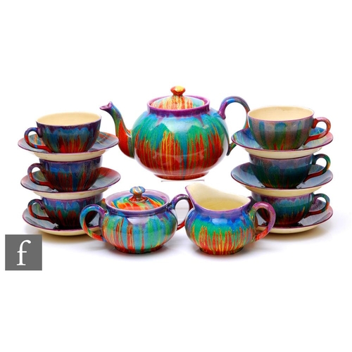 465 - Clarice Cliff - Delecia - An early Globe shape tea set circa 1931, comprising teapot, covered sugar,... 