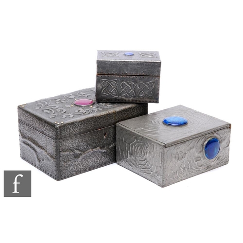 60 - Unknown - Three Arts and Crafts pewter boxes, all of rectangular form with embossed decoration and R... 