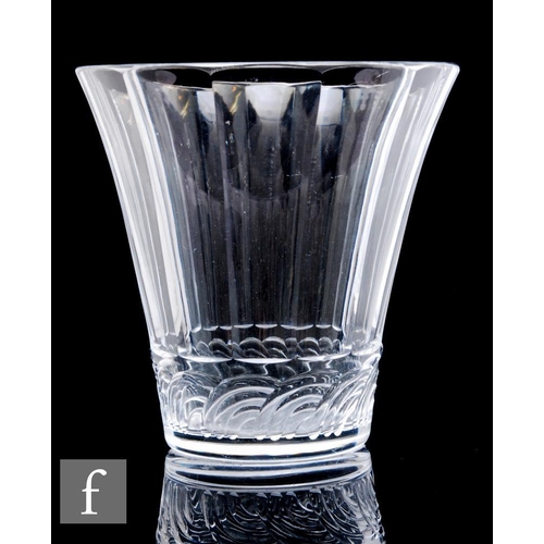 655 - Keith Murray - Stevens & Williams - A 1930s Art Deco clear cut crystal glass vase of flared form... 