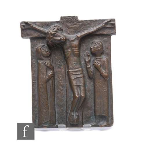 71 - Joseph Strassle - A bronze cast metal plaque depicting Christ on the cross and two disciples in atte... 