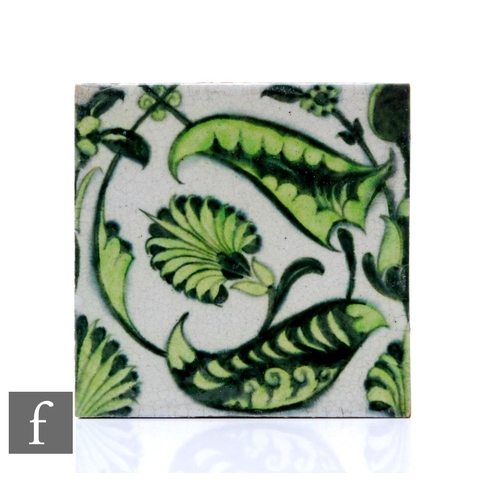 84 - William De Morgan - Sands End Pottery - A 6 inch plastic clay tile decorated in the Persian taste wi... 