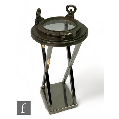 1120 - Eichholtz - A porthole 'HMS Victory' side table, with nickel finish and lucite circular top, height ... 