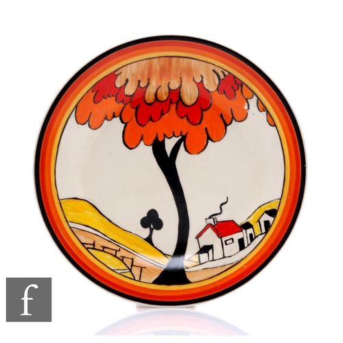 308 - Clarice Cliff - House & Bridge - A small circular side plate circa 1931, hand painted with a sty... 