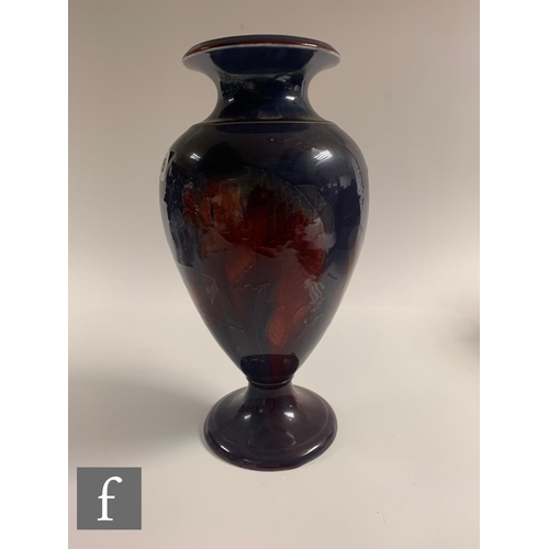 185 - William Moorcroft - A large pedestal vase circa 1915/20, the footed shouldered ovoid body rising to ... 