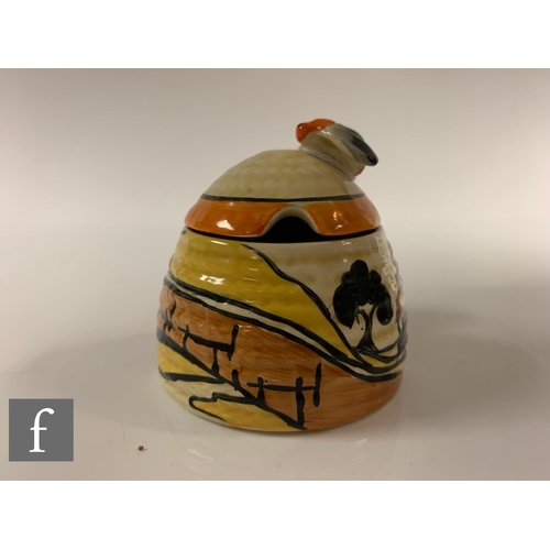 276 - Clarice Cliff - House & Bridge - A small beehive honey pot circa 1932, hand painted in the House... 