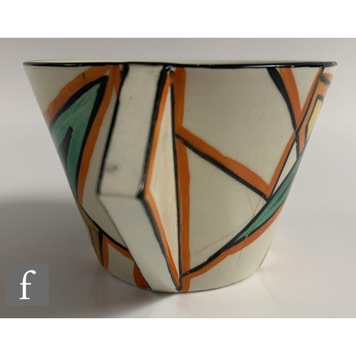 341 - Clarice Cliff - Latona Stained Glass - A Conical tea cup and saucer circa 1930, hand painted with ab... 