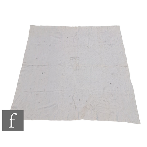 857 - A large late 19th to early 20th Century white cotton bedspread with a contrasting white floral desig... 