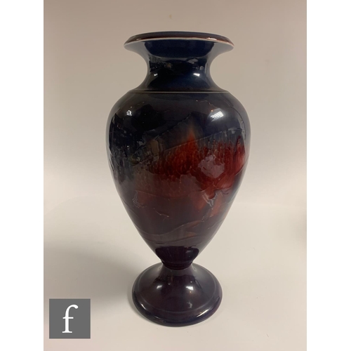 185 - William Moorcroft - A large pedestal vase circa 1915/20, the footed shouldered ovoid body rising to ... 