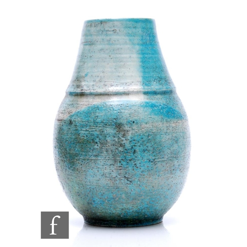 1104 - Abdo Nagi - A later 20th Century studio pottery vase, the ovoid base with stepped tapered collar nec... 