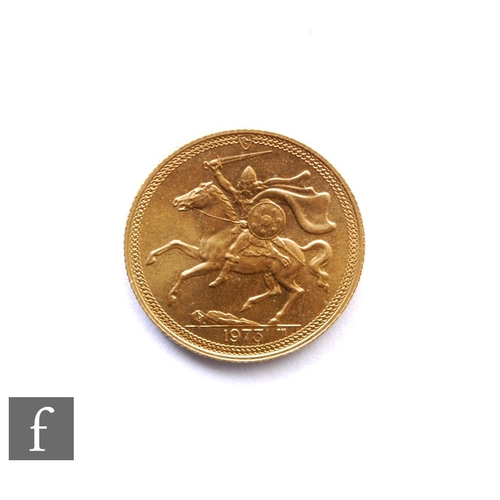 265 - Elizabeth II - A 1973 sovereign, Isle of Man, reverse Norse warrior on horseback.