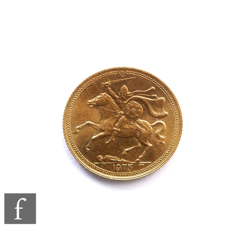 266 - Elizabeth II - A 1973 sovereign, Isle of Man, reverse Norse warrior on horseback.