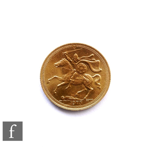 267 - Elizabeth II - A 1973 sovereign, Isle of Man, reverse Norse warrior on horseback.