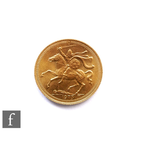 268 - Elizabeth II - A 1973 sovereign, Isle of Man, reverse Norse warrior on horseback.