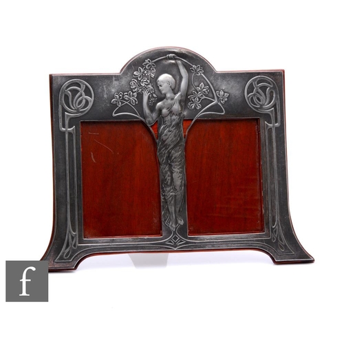 271 - An WMF (Catalogue number 32/2), Art Nouveau polished pewter double photograph frame with a central s... 